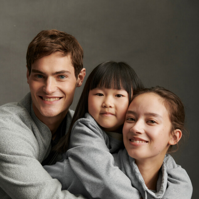 Family smiling posing.